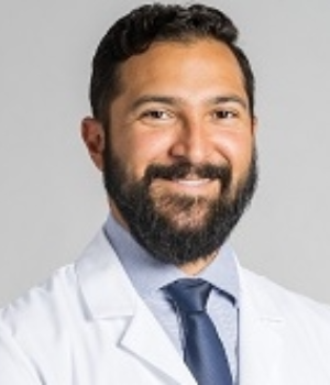V. Karlos Arcos MD